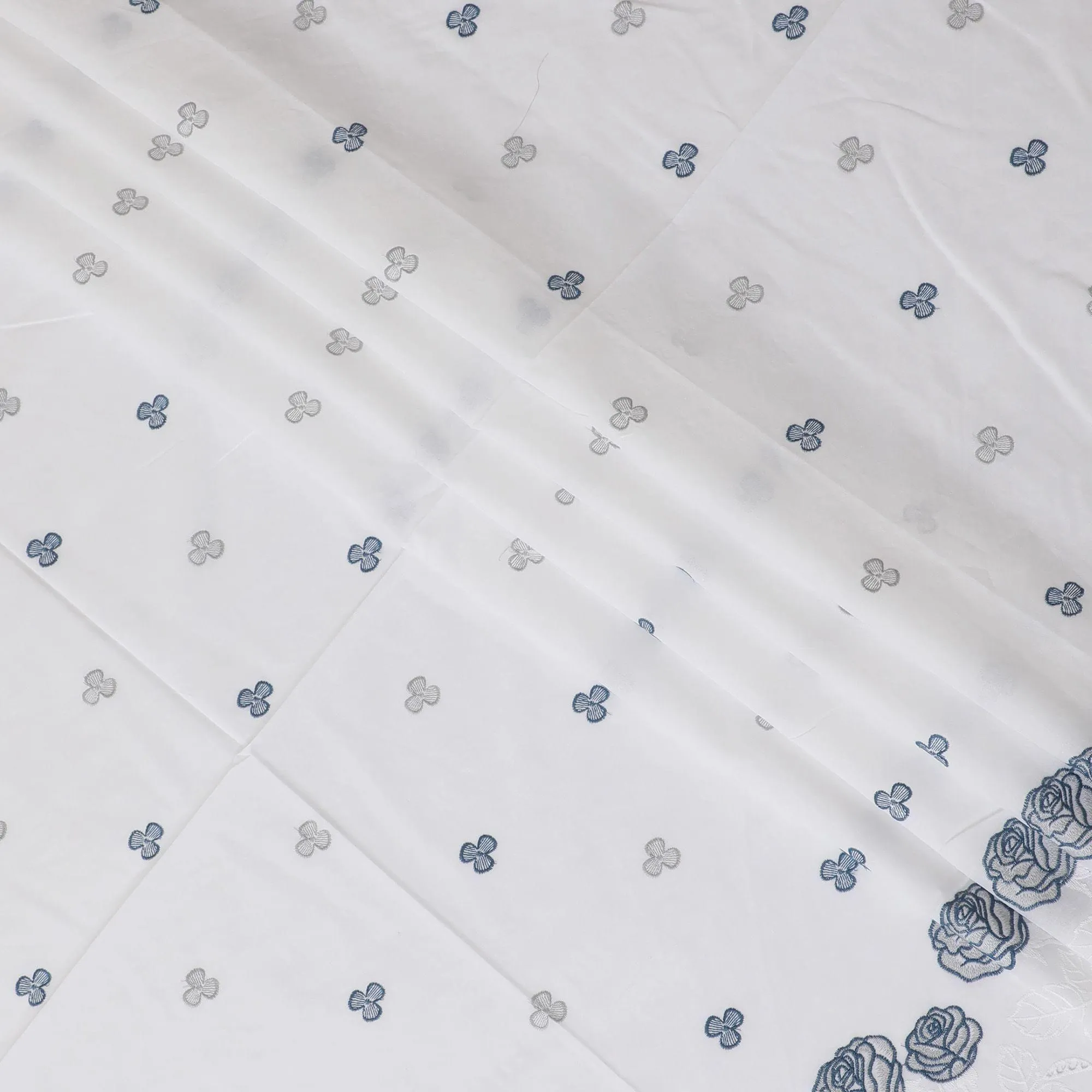 White premium pure cotton voile fabric with same tone and blue embroidery in floral design-D13602