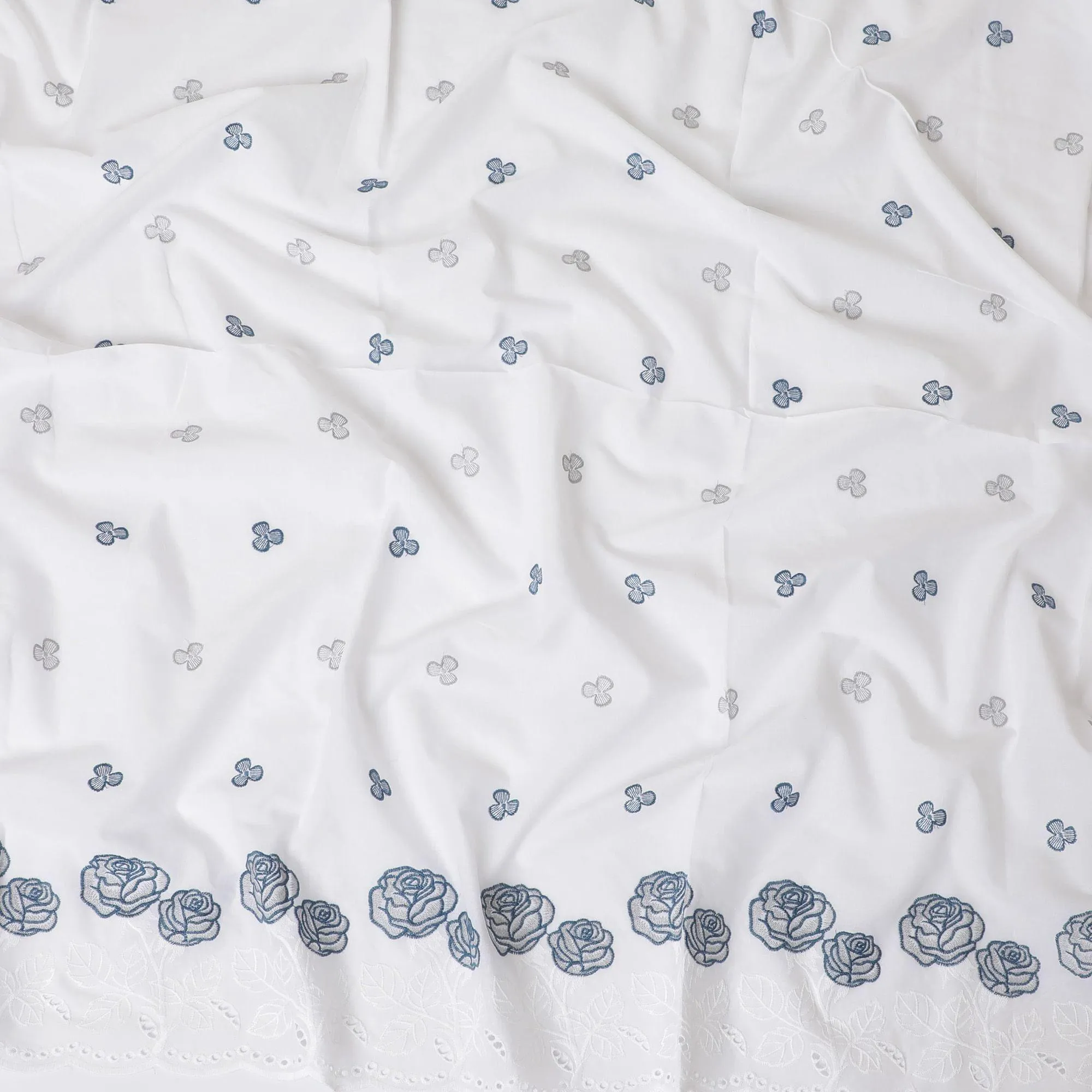 White premium pure cotton voile fabric with same tone and blue embroidery in floral design-D13602